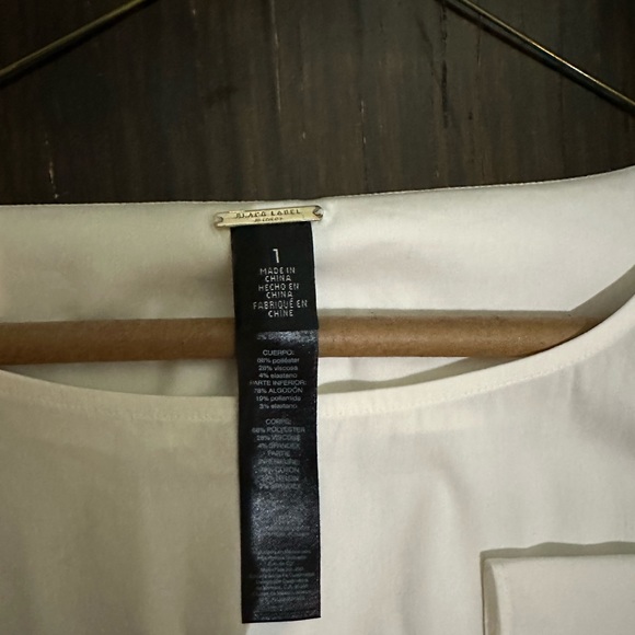 WHITE BLOUSE WITH DRAPED OPEN ARM SLEEVE WITH ELEGANT BUTTON CLOSURE - Picture 3 of 9